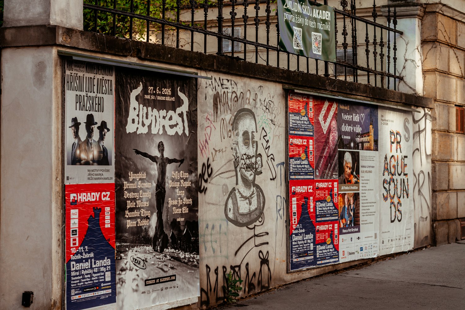 A city wall covered with posters