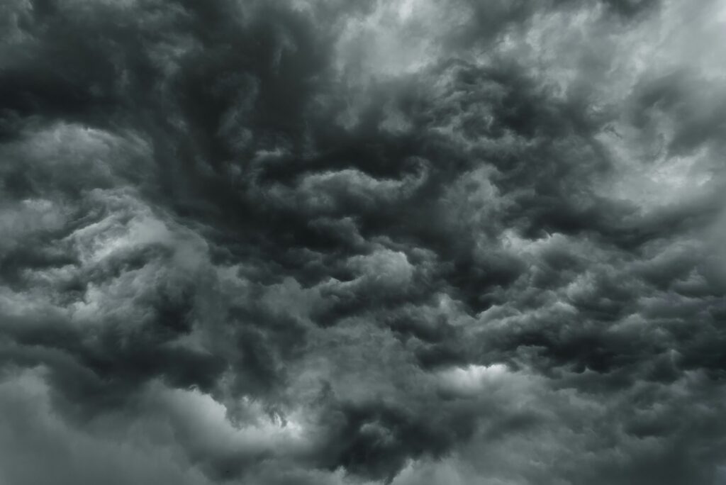 Dark, heavy storm clouds filling the sky