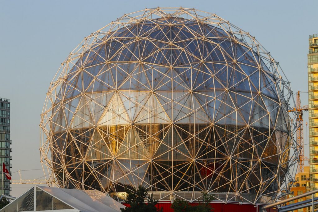 A geodesic dome made of glass panels and a metal frame