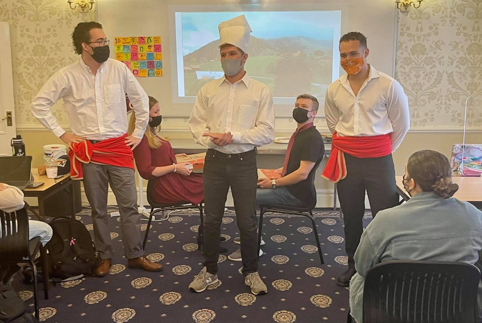 Students act out a skit as part of their final presentation